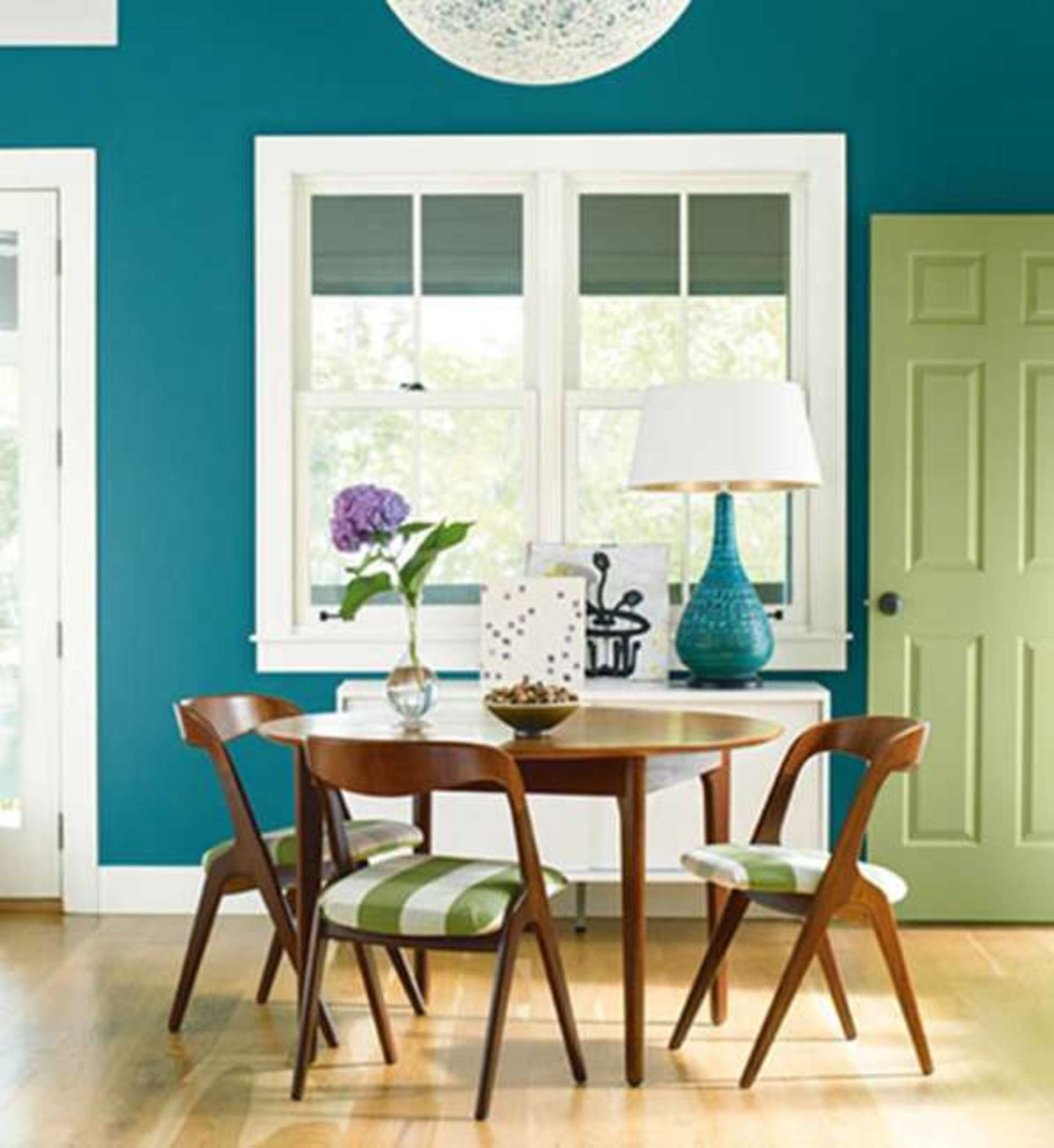a modern dining room with bold colours